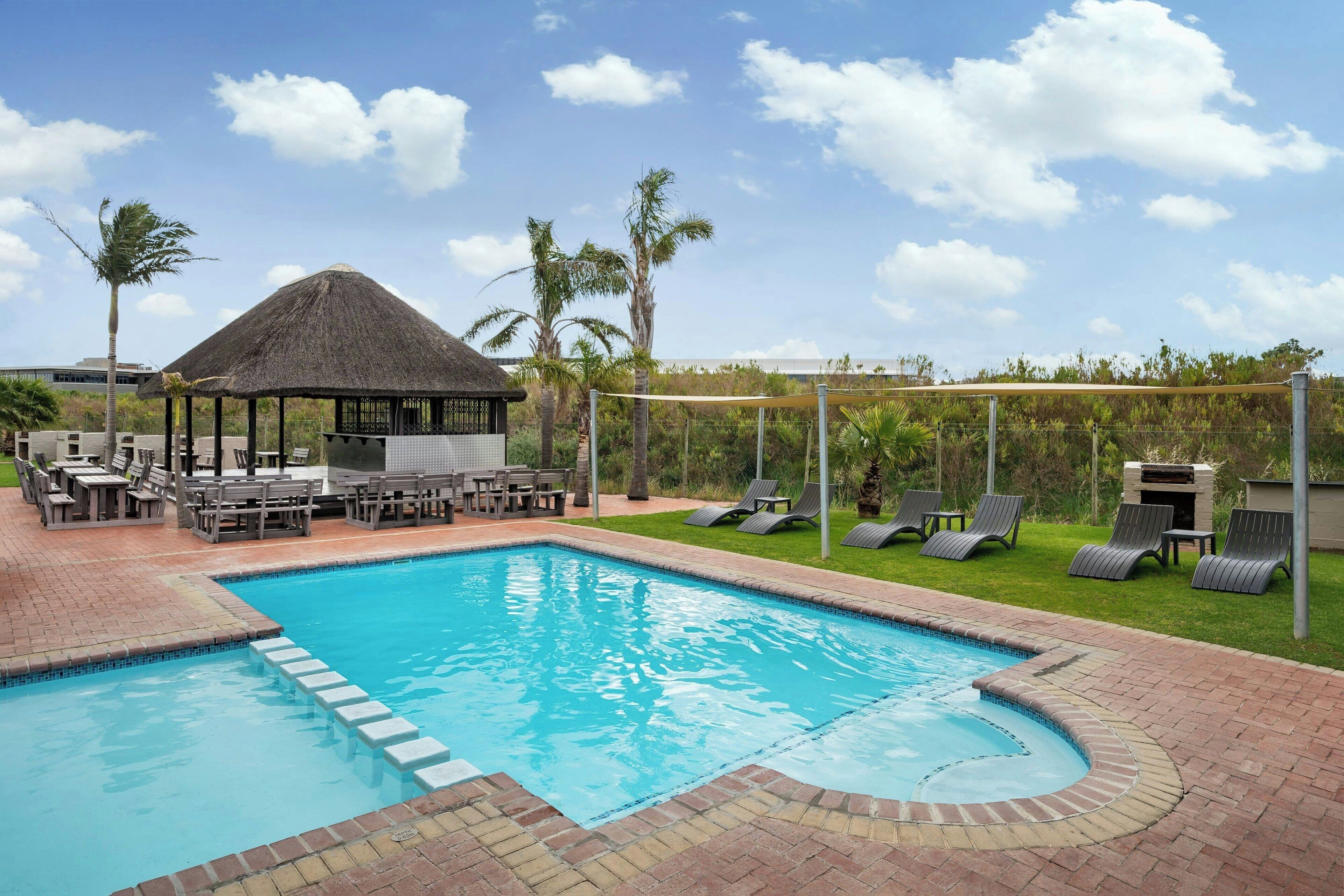 2 outdoor pools, pool umbrellas, sun loungers
