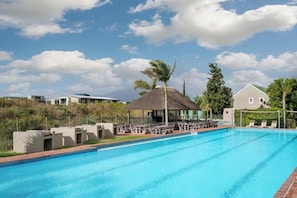 2 outdoor pools, pool umbrellas, pool loungers