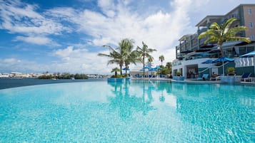 Seasonal outdoor pool, pool umbrellas, pool loungers