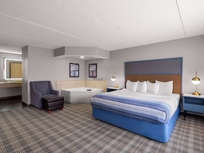 Deluxe Suite, 1 King Bed, Non Smoking | In-room safe, desk, laptop workspace, iron/ironing board