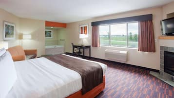 Luxury Suite, 1 King Bed, Non Smoking (Deluxe, One Bedroom) | In-room safe, desk, laptop workspace, iron/ironing board