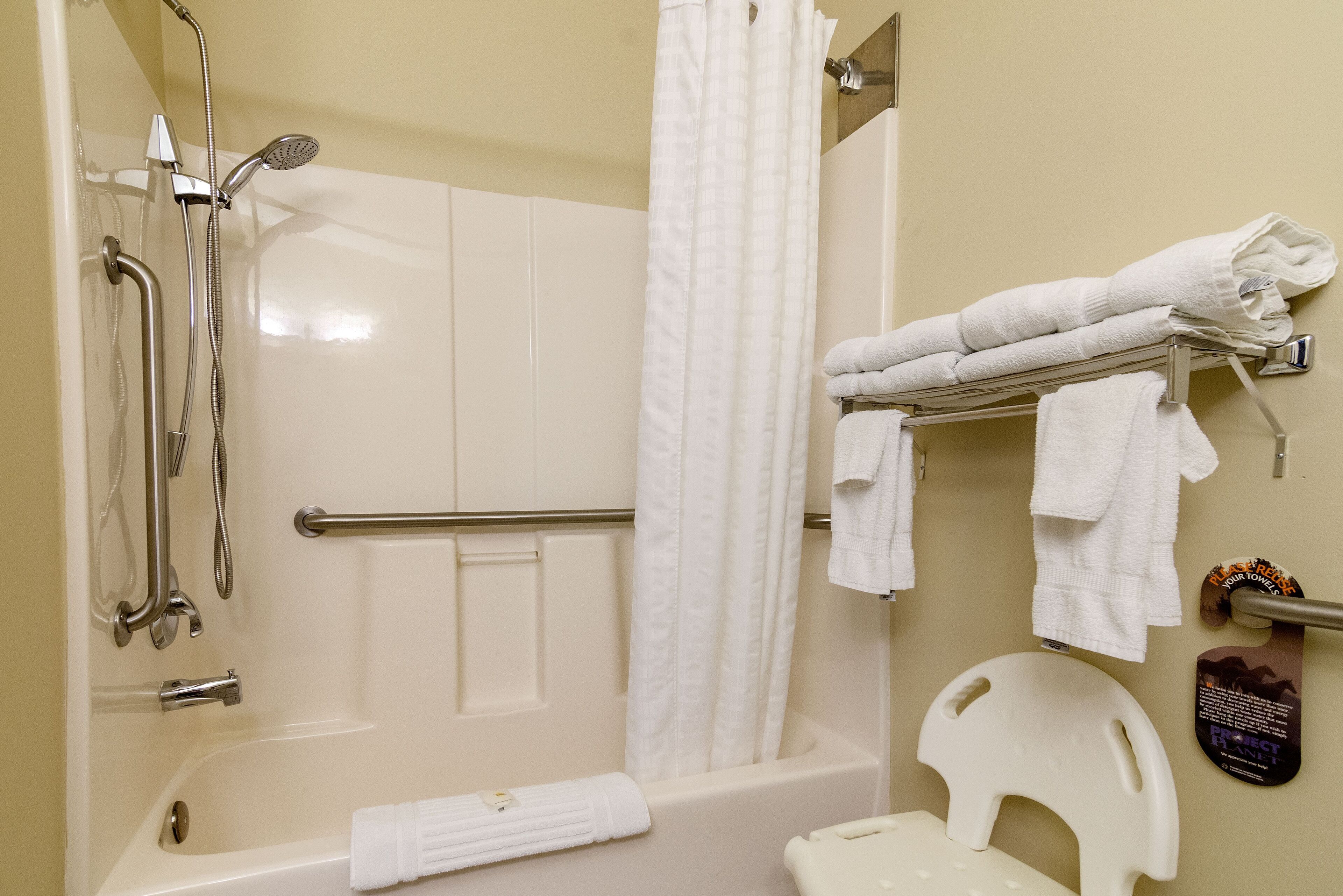 room, 1 king bed, accessible, non smoking | bathroom | combined shower/bathtub, free toiletries, hair dryer, towels