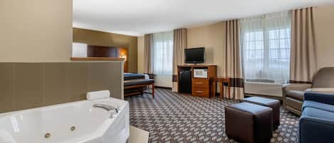 Suite, 1 trÚs grand lit et 1 canapé-lit, non-fumeur | Fer et planche à repasser, accÚs au Wi-Fi (inclus), literie fournie