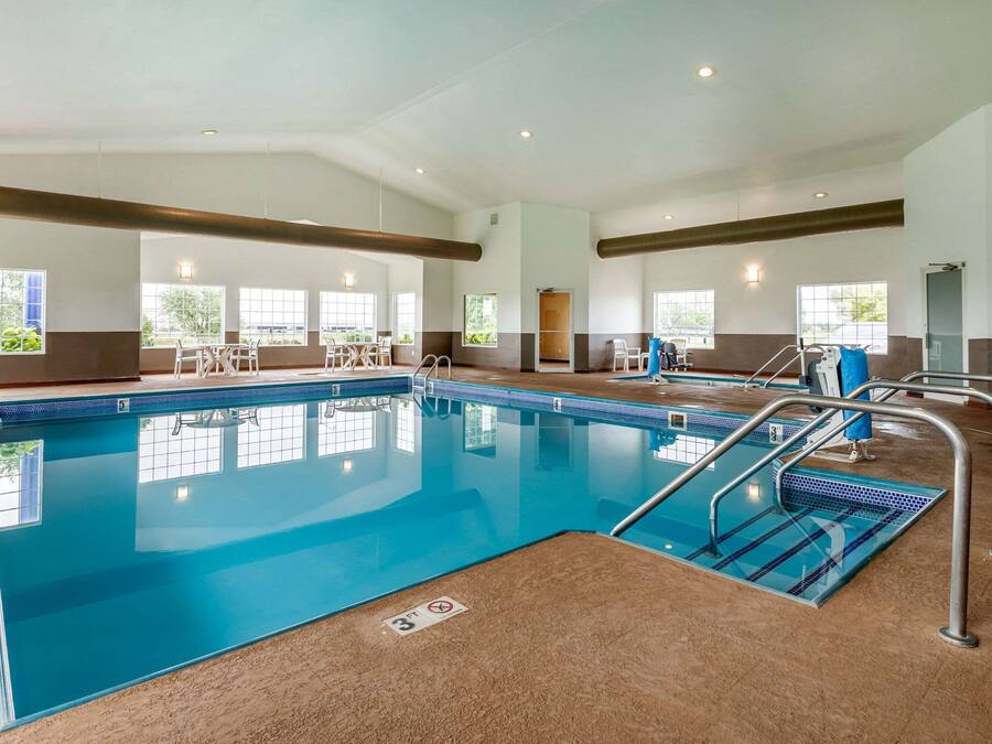 Indoor pool, open 6:00 AM to 10:00 PM, pool loungers