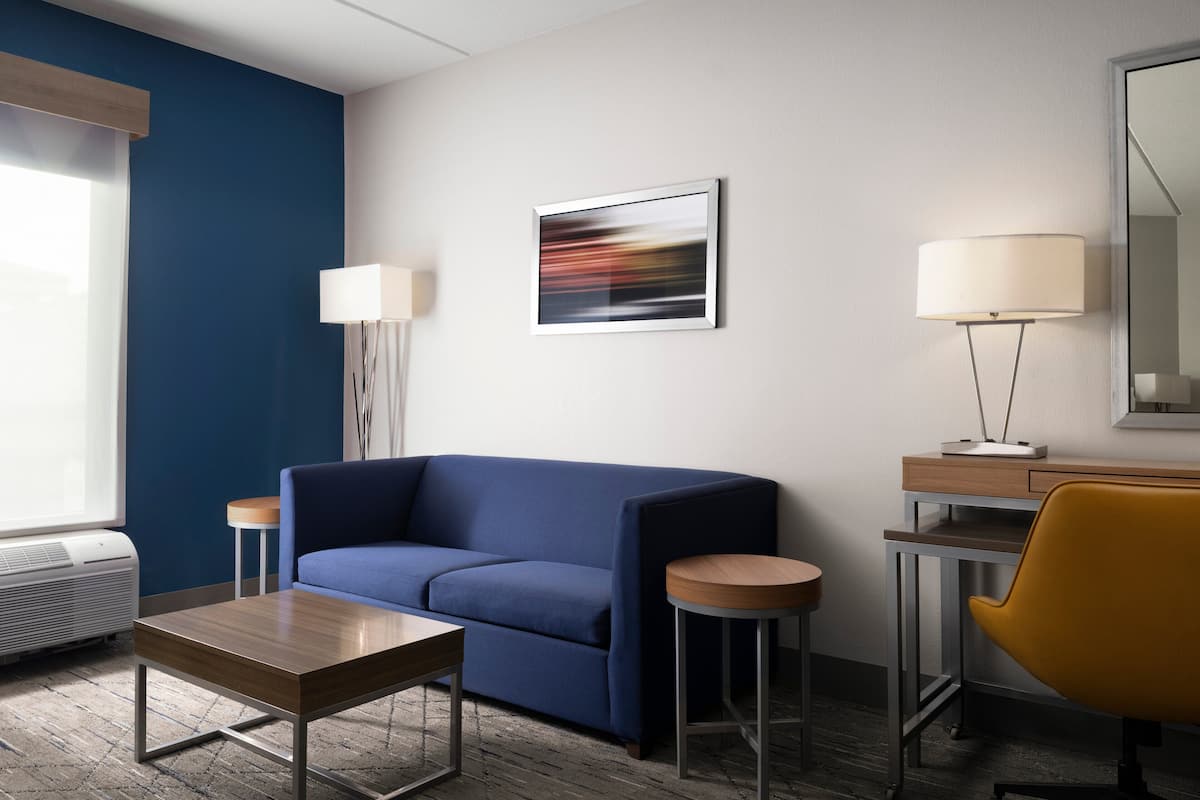 suite, 1 king bed (additional living area) | 1 bedroom, premium bedding, pillow-top beds, desk