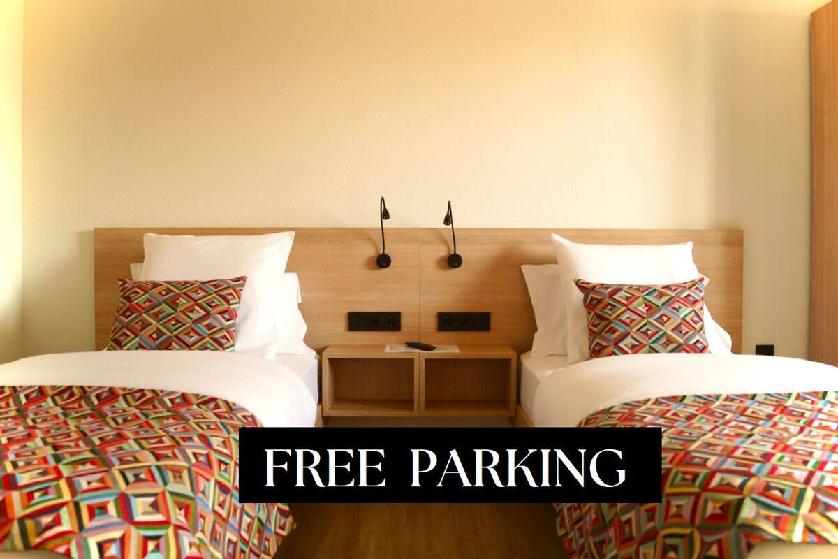 Twin Room | 1 bedroom, desk, blackout drapes, soundproofing