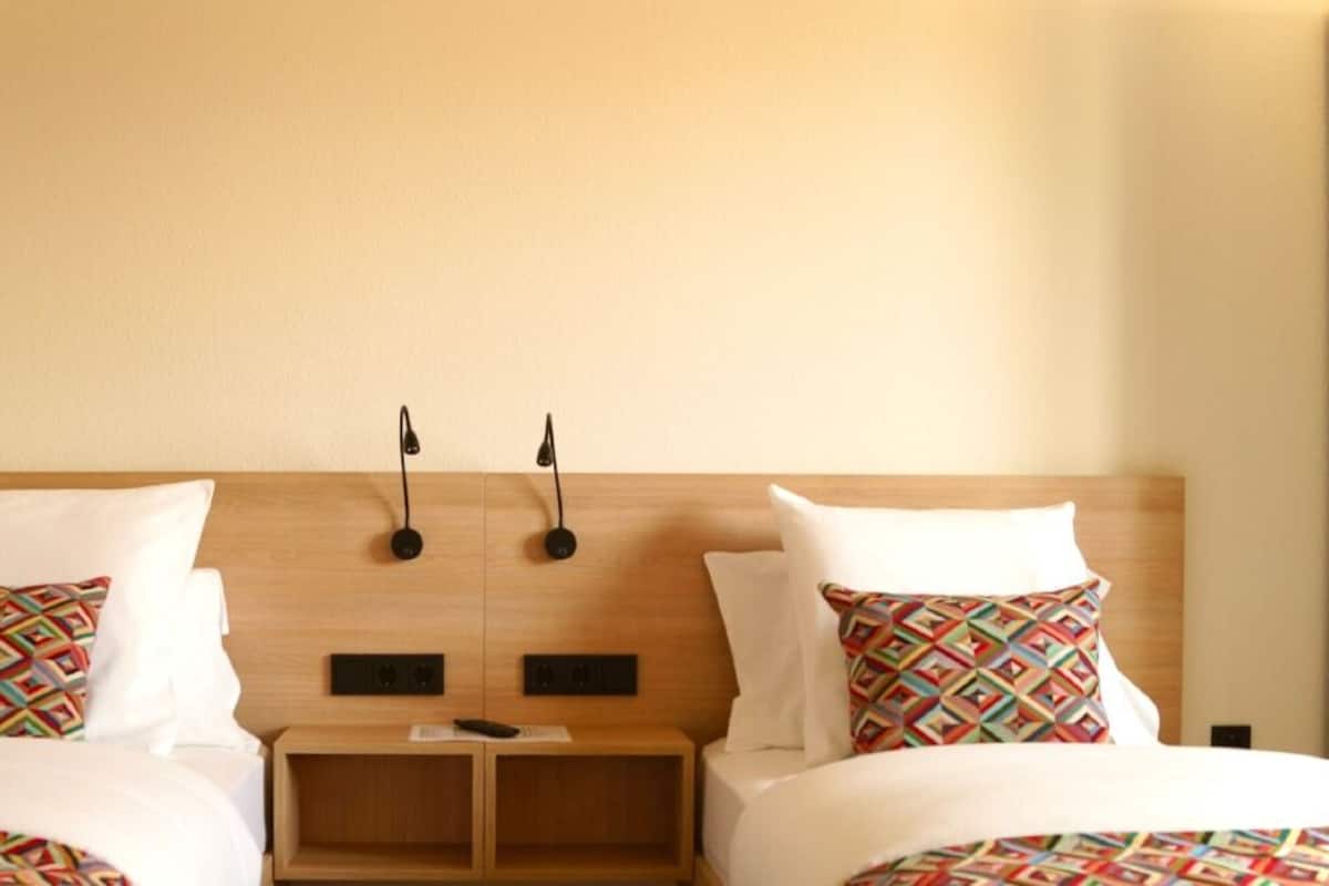 Twin Room | Desk, blackout drapes, soundproofing, iron/ironing board
