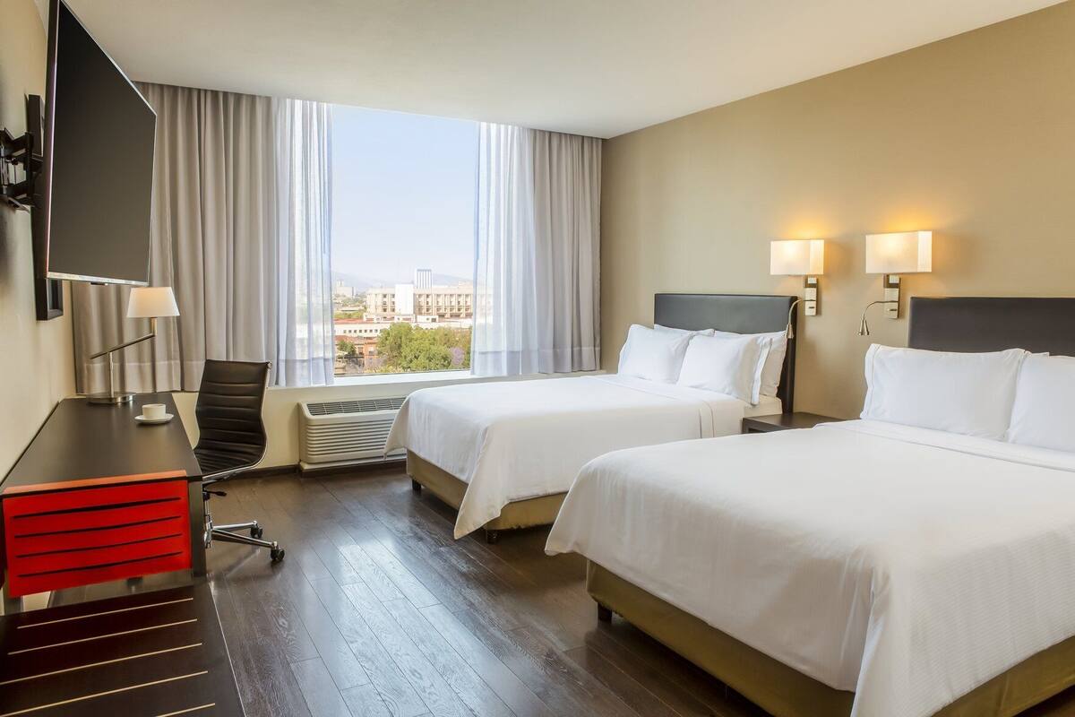 Hypo-allergenic bedding available, in-room safe, desk, laptop workspace