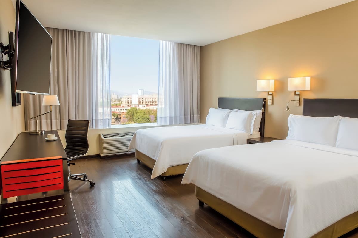 Hypo-allergenic bedding, in-room safe, desk, laptop workspace