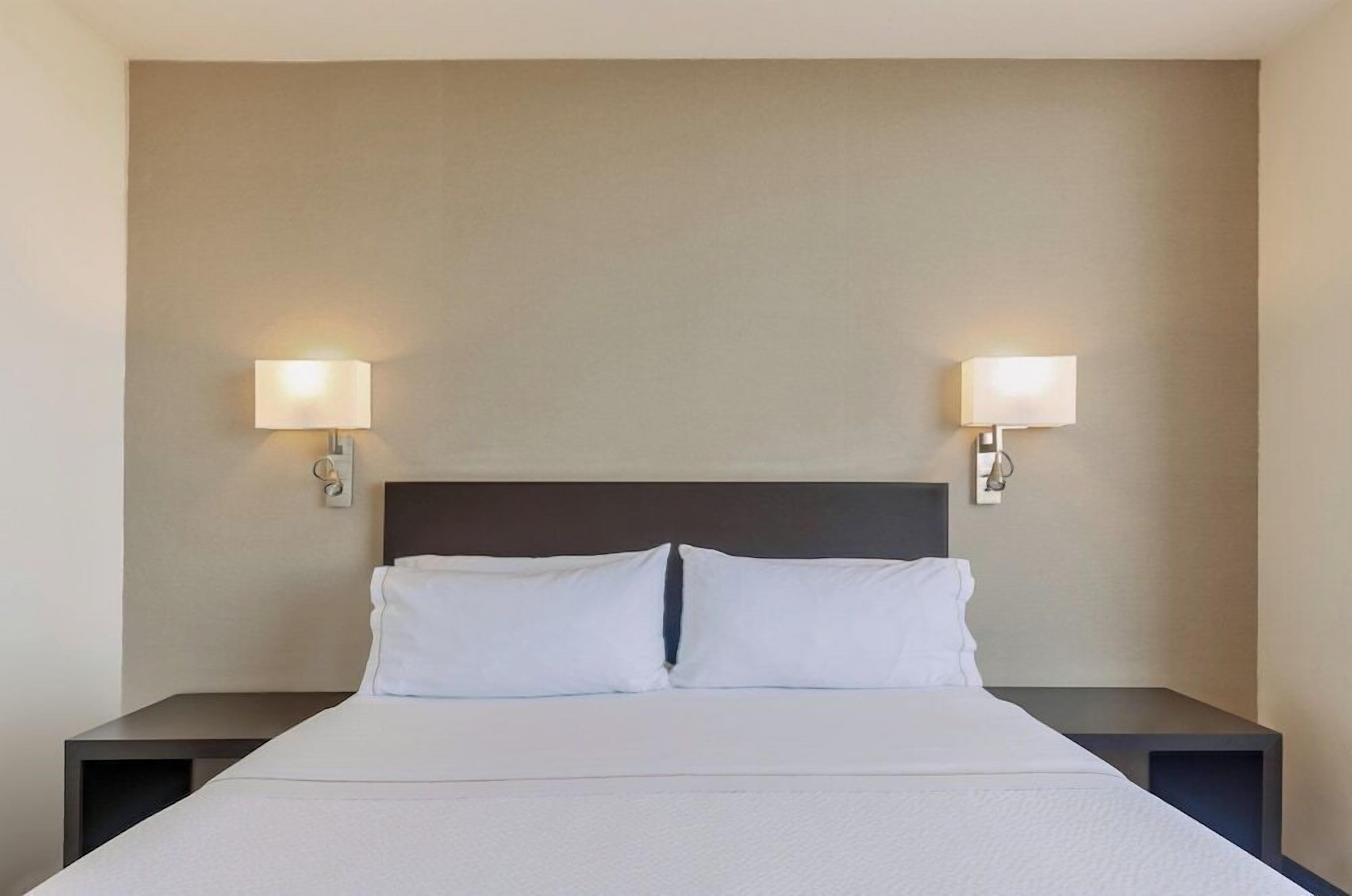 Hypo-allergenic bedding, in-room safe, desk, laptop workspace