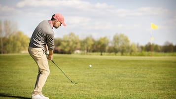 Golfers can tee off from the lush green fairway.