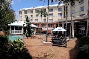 Outdoor pool, open 8:00 AM to 7:30 PM, pool umbrellas - The Riverside Hotel (Durban North)