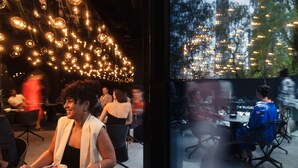 An indoor dining area with hanging lights and a view of the outdoors through a glass wall. - Zonar Zagreb by Maistra City Vibes (Zagreb)