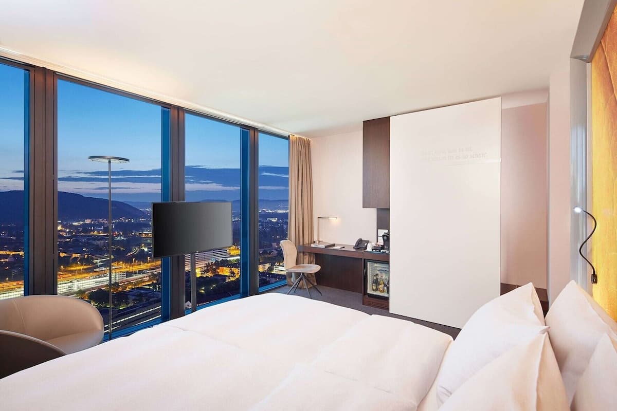 Premium bedding, minibar (free items), desk, laptop workspace