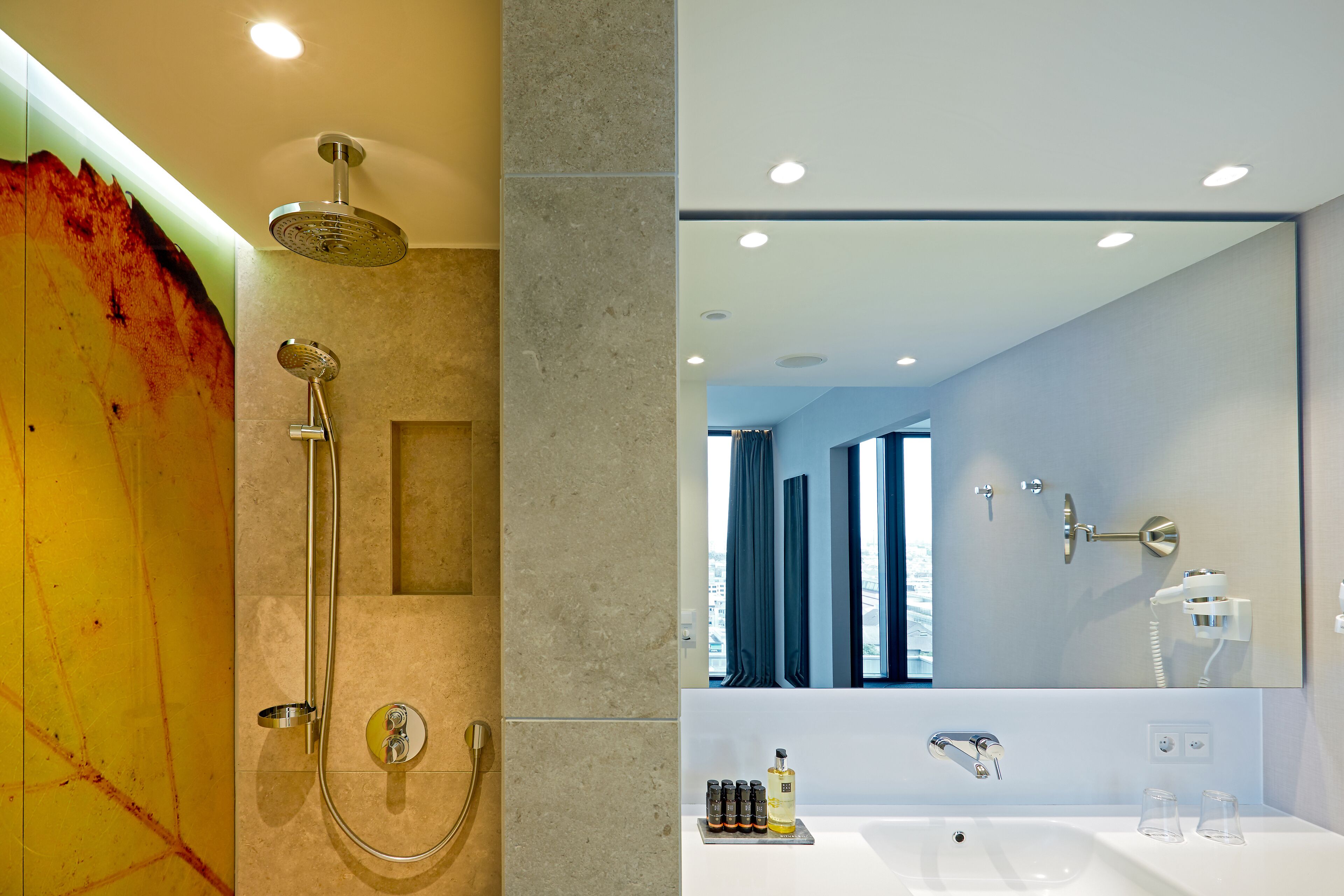 suite | bathroom | shower, rainfall showerhead, hair dryer, towels