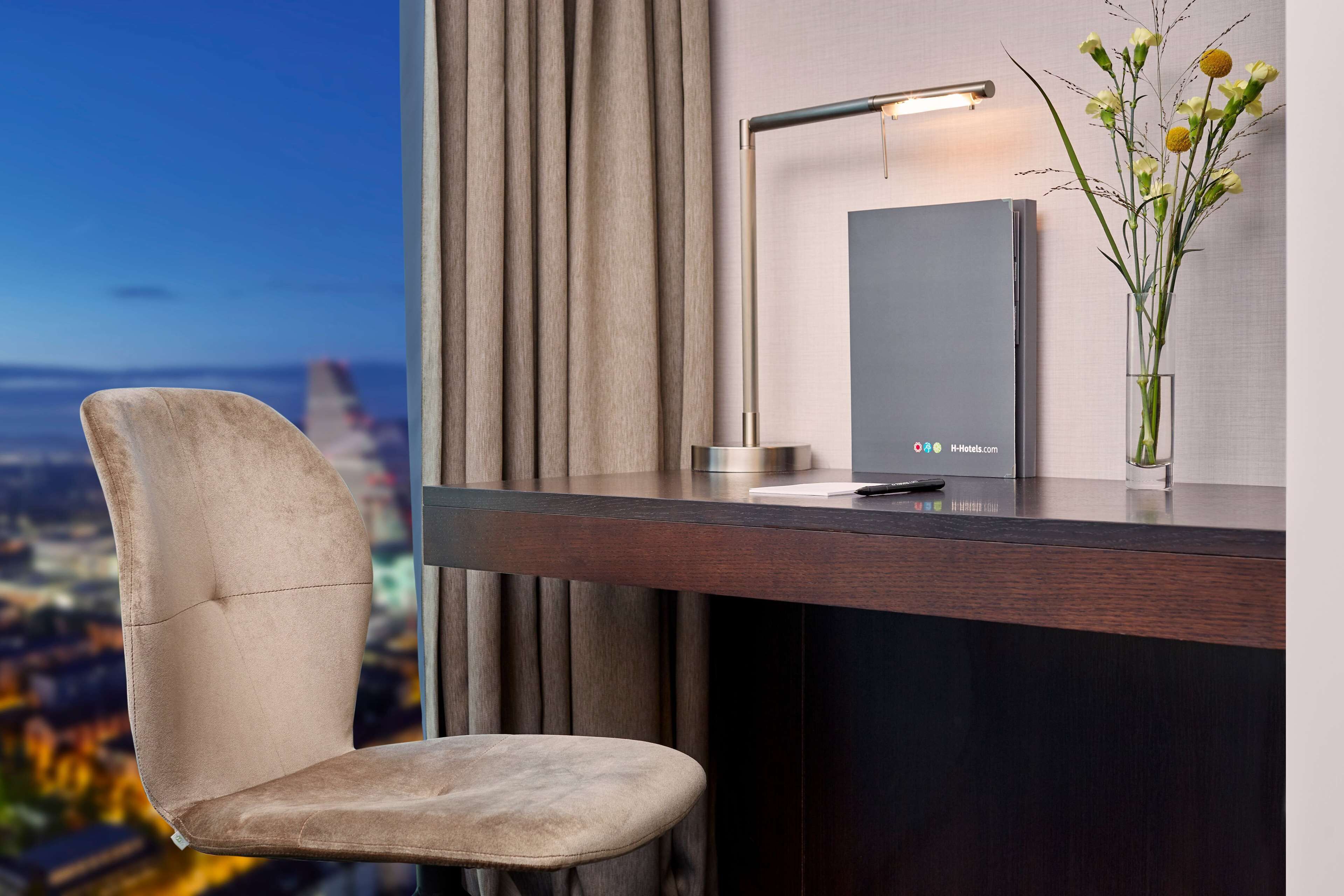 premium bedding, free minibar, desk, laptop workspace