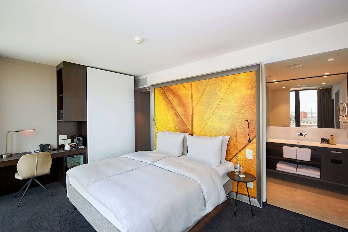 Premium bedding, minibar (free items), desk, laptop workspace