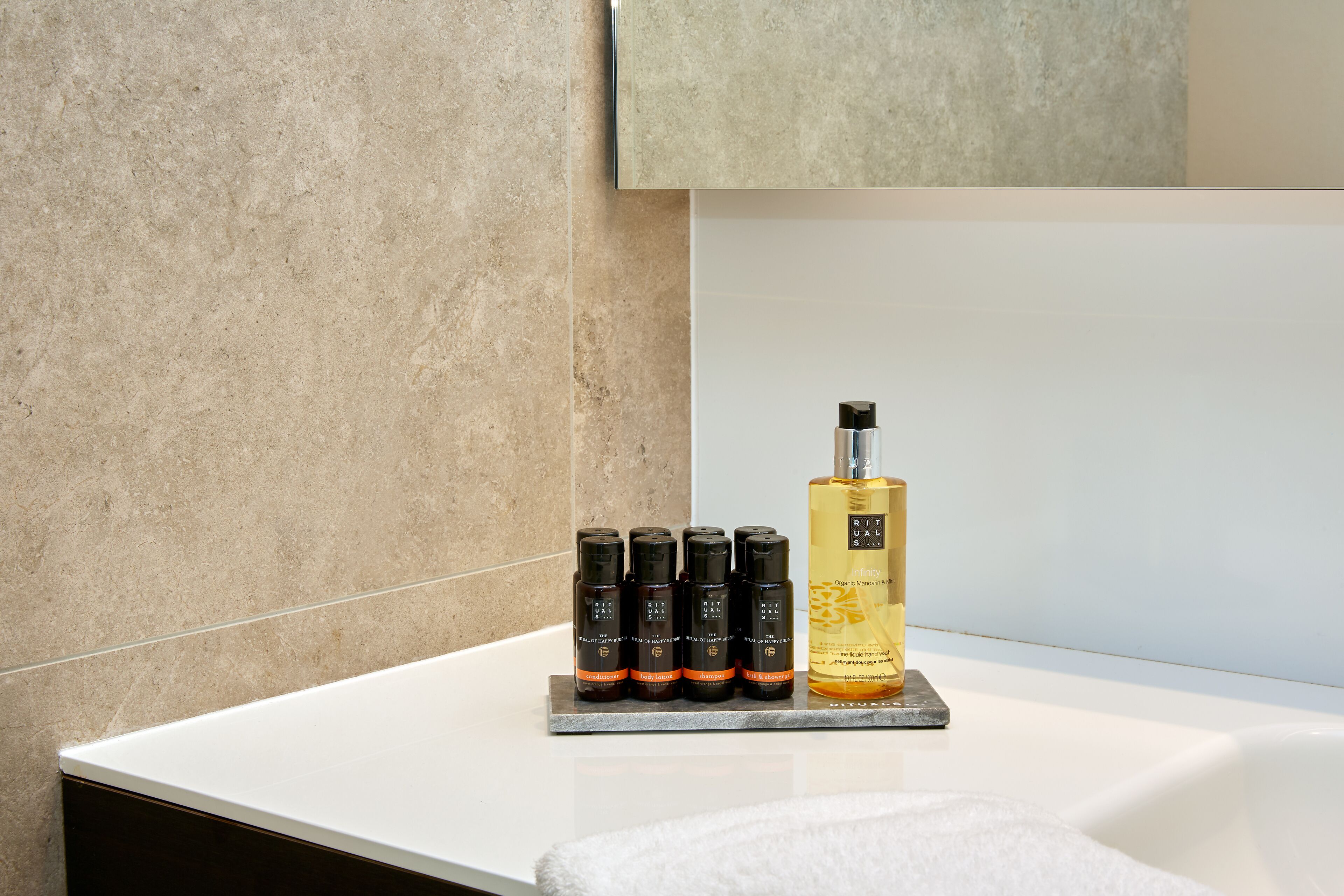 shower, rainfall showerhead, hair dryer, towels