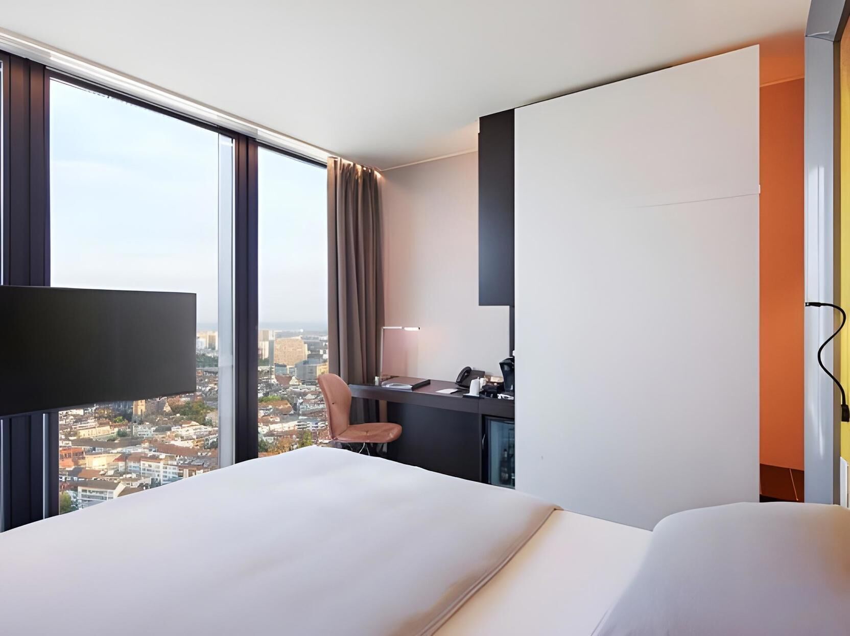 Premium bedding, free minibar, desk, laptop workspace