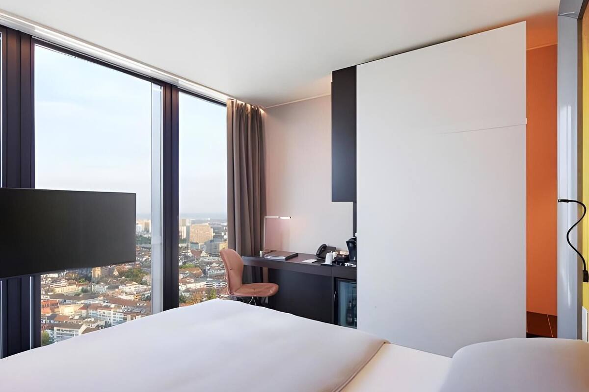 Premium bedding, minibar (free items), desk, laptop workspace
