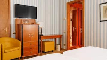 Minibar, coffres-forts dans les chambres, réveils