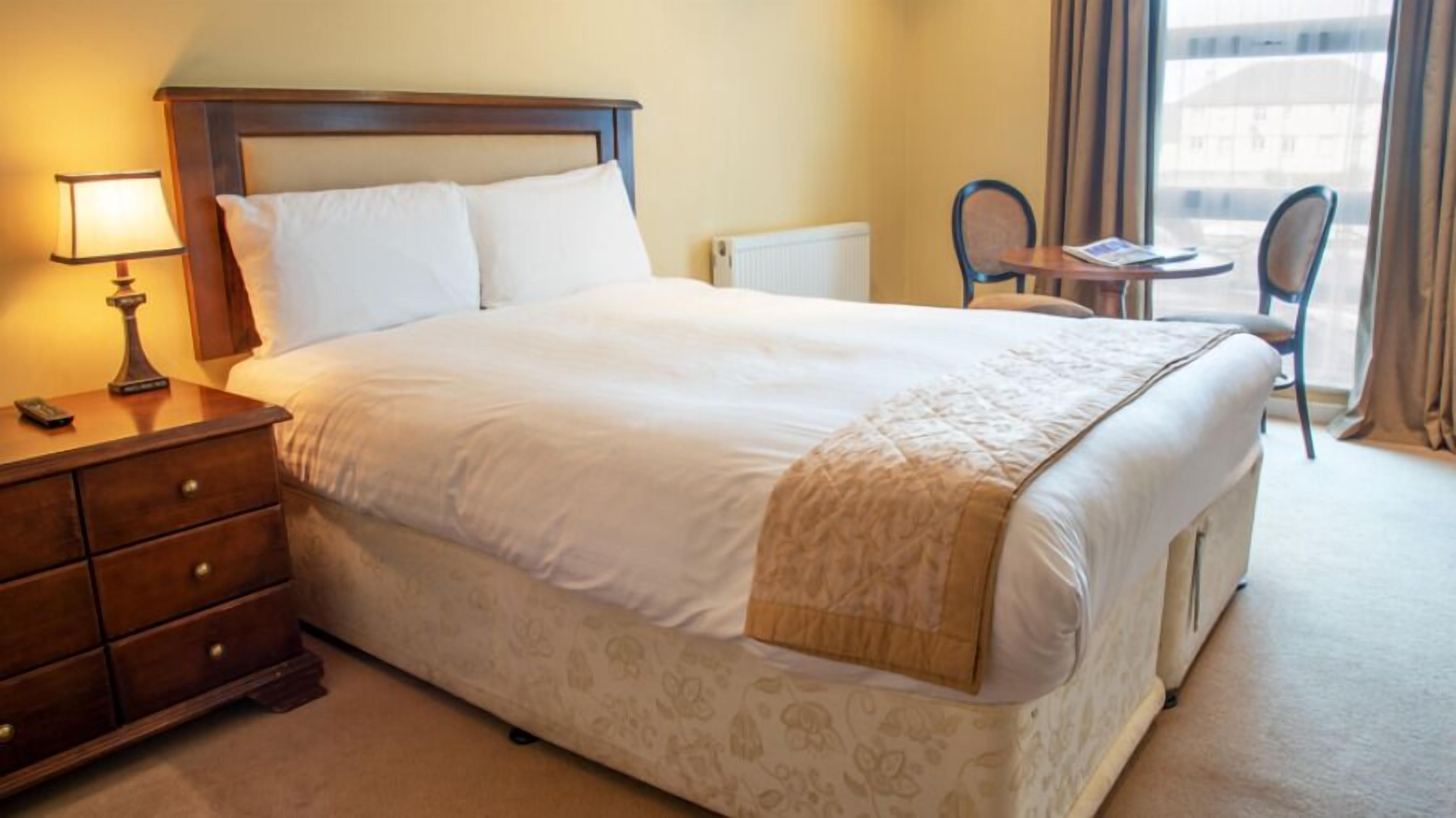 standard single room | in-room safe, desk, laptop workspace, free wifi