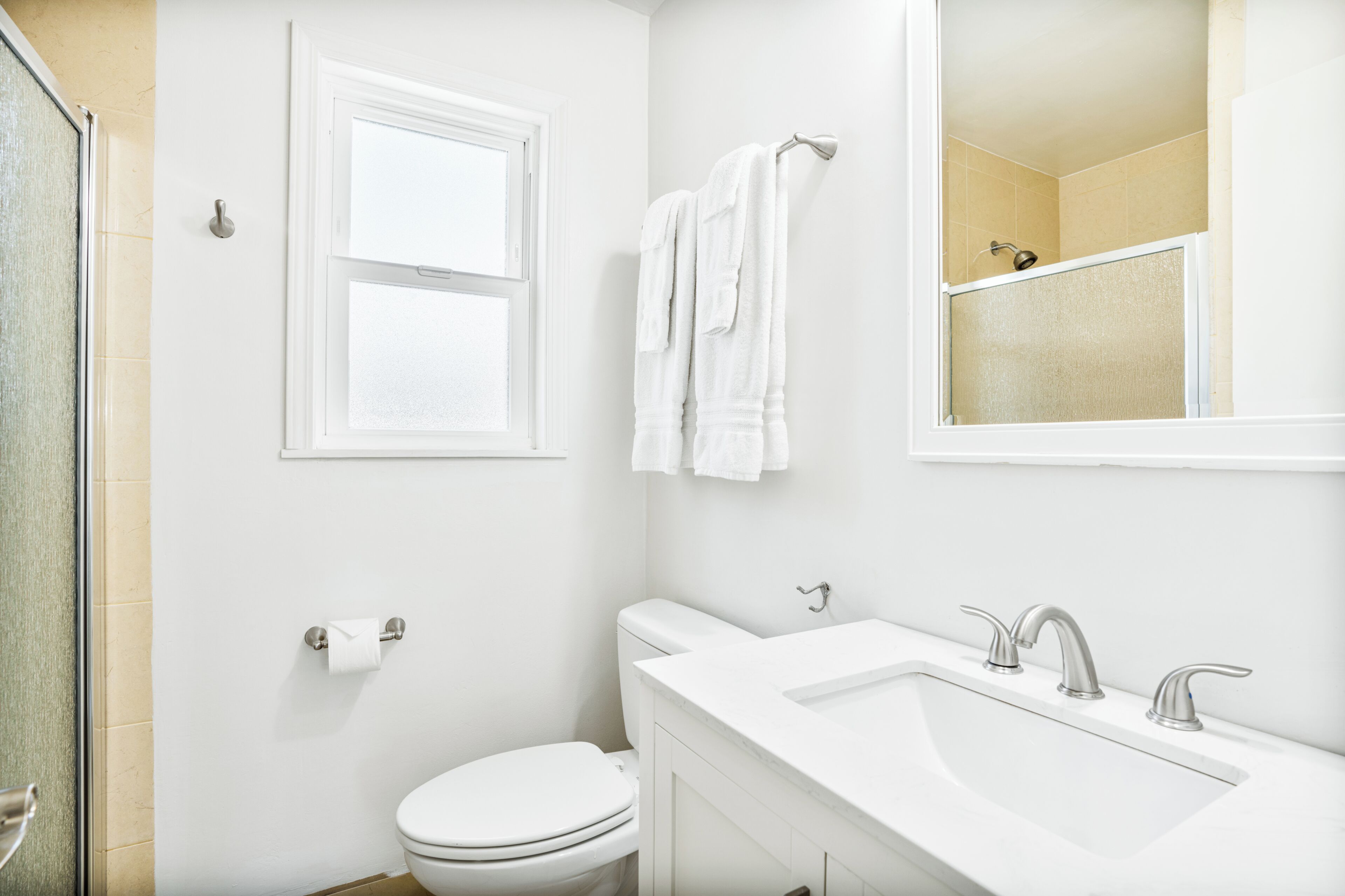 premium bedding, pillow-top beds, blackout curtains, iron/ironing board