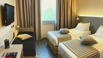 Deluxe-Dreibettzimmer | Hochwertige Bettwaren, Daunenbettdecken, Minibar, Zimmersafe