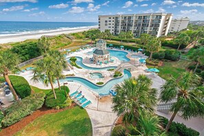 Indoor pool, seasonal outdoor pool, open 9 AM to 10 PM, pool umbrellas