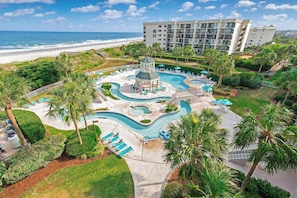 Indoor pool, seasonal outdoor pool, open 9 AM to 10 PM, pool umbrellas