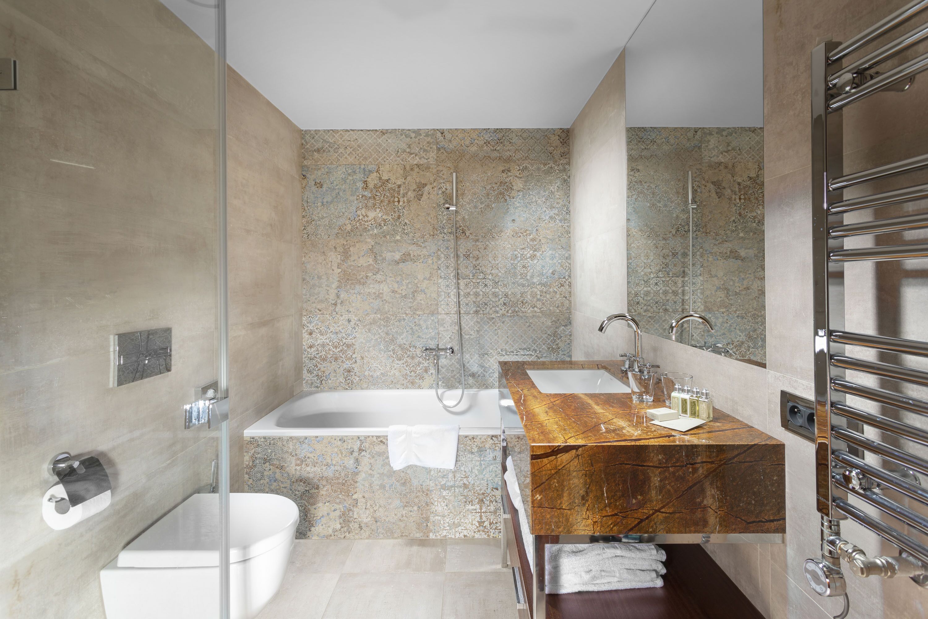 combined shower/bathtub, deep-soaking bathtub, designer toiletries