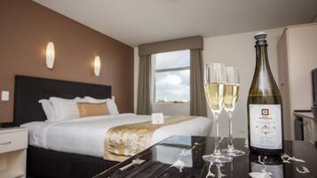 King room with Spa | Living area | 86-cm LCD TV with digital channels, TV