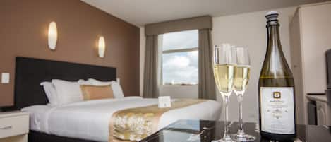 King room with Spa | Living area | 86-cm LCD TV with digital channels, TV