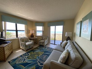 Gulf Front Condo 201 | Living area | 32-inch flat-screen TV with cable channels, LCD TV