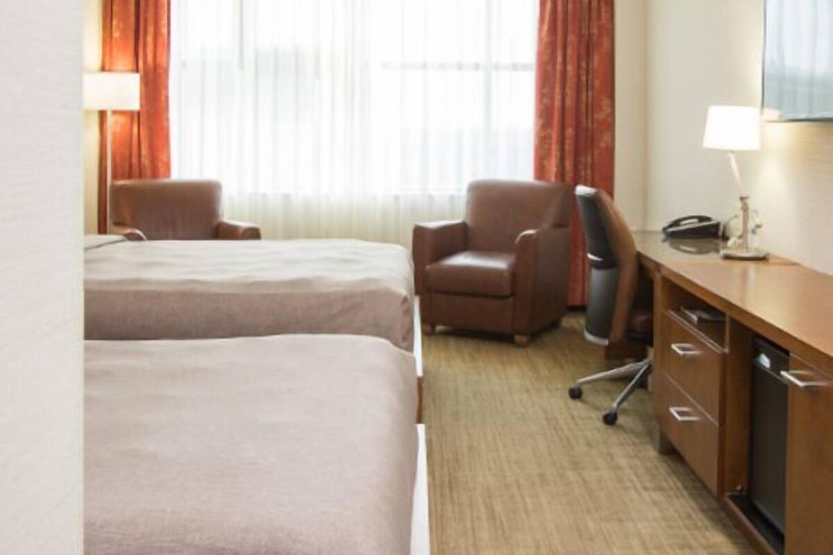 Literie de qualité supérieure, coffres-forts dans les chambres, bureau