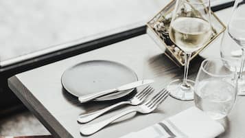 Breakfast, dinner served; local cuisine, al fresco dining