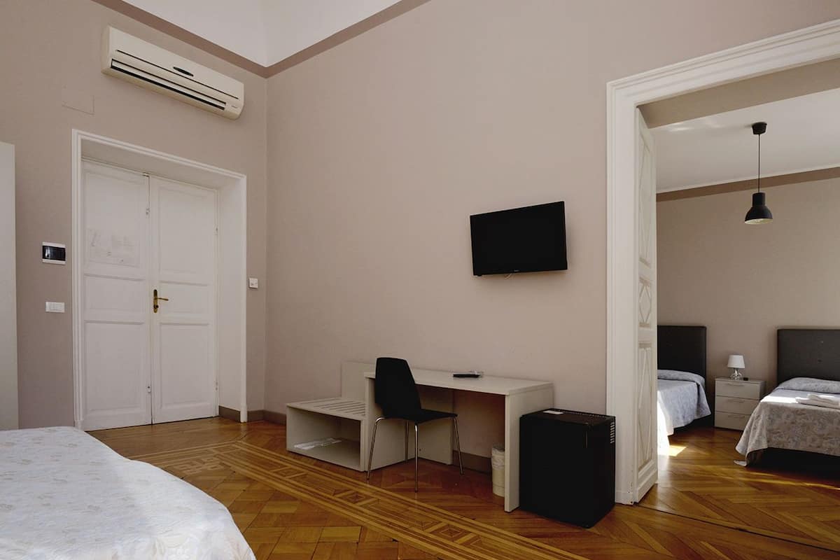 Family Room | Premium bedding, down comforters, memory foam beds, minibar