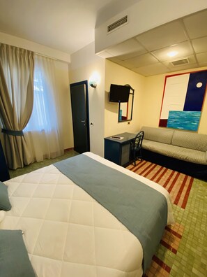 Down comforters, minibar, in-room safe, desk