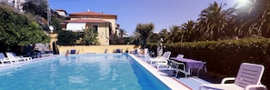 Seasonal outdoor pool, open 9:00 AM to 7:30 PM, sun loungers