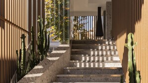 A staircase with a modern design, leading to a higher level. - BIO BOUTIQUE HOTEL XU' (Rimini)