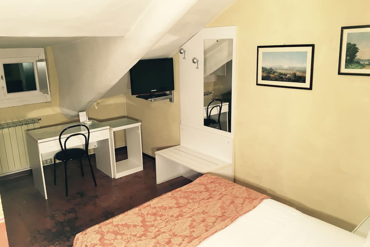 Habitación | Ropa de cama de alta calidad y minibar