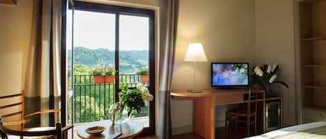 Suite junior | Minibar, caja fuerte, escritorio y wifi gratis