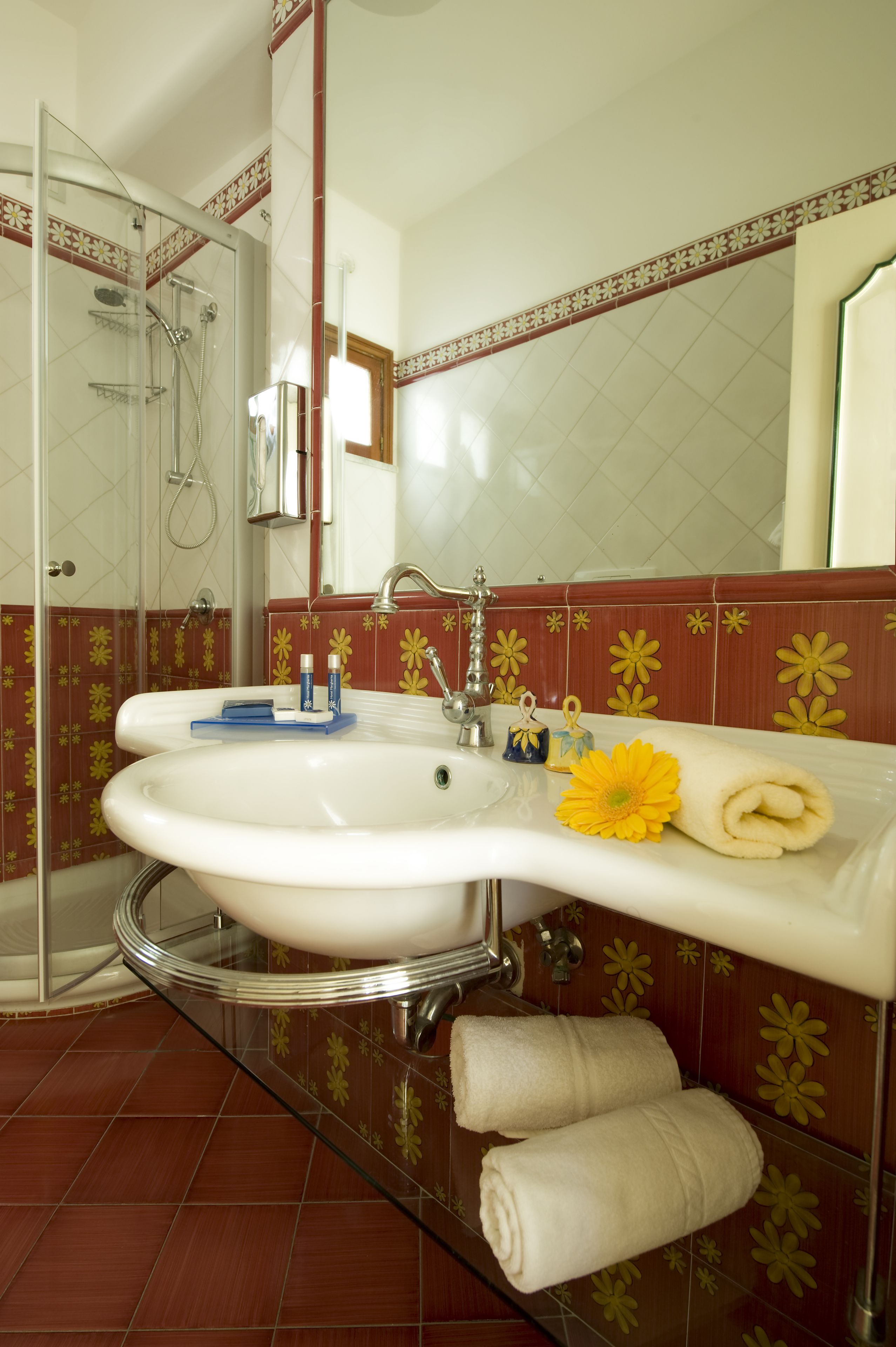 rainfall showerhead, eco-friendly toiletries, hair dryer, bathrobes