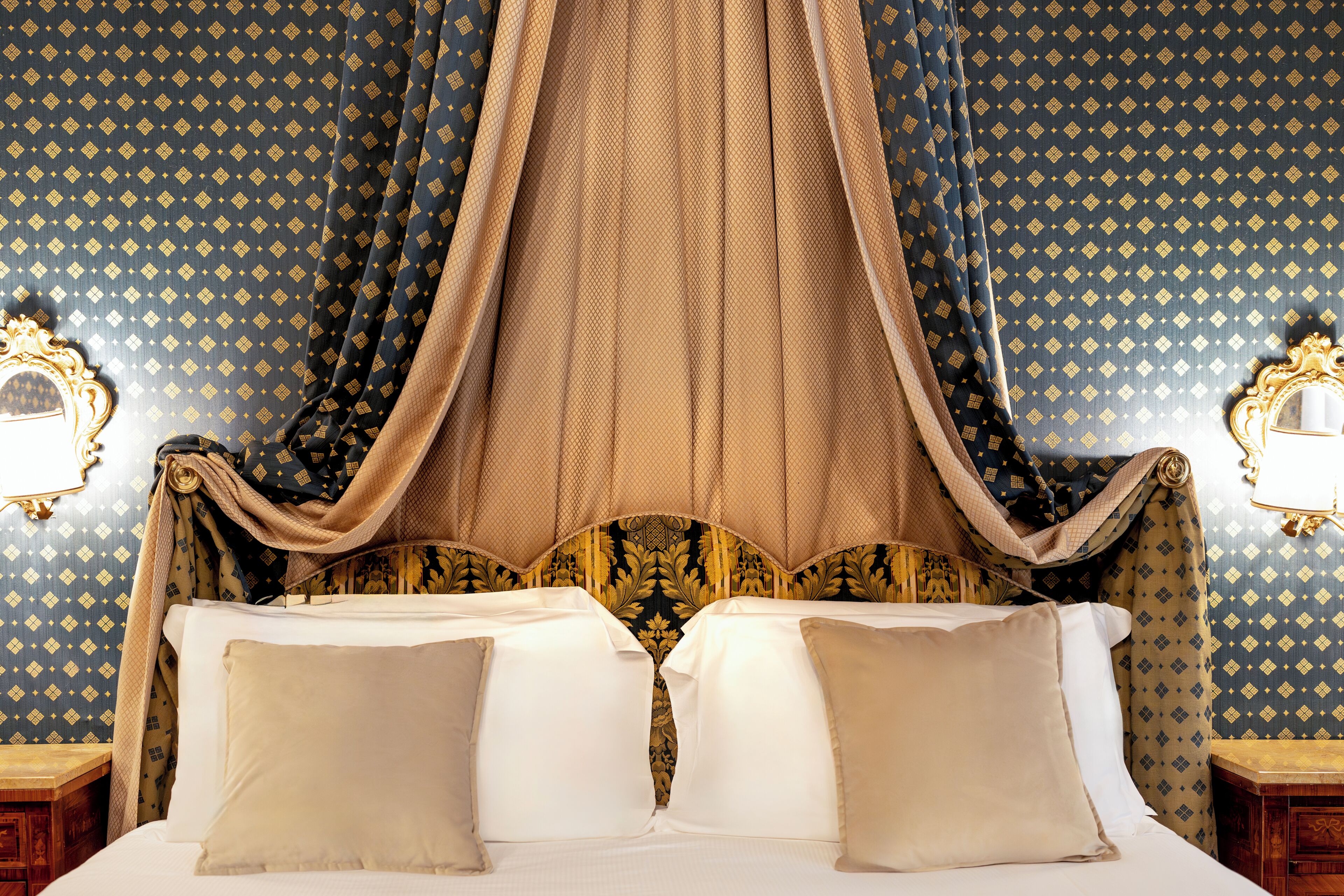 junior suite gritti partial canal view | minibar, in-room safe, desk, laptop workspace