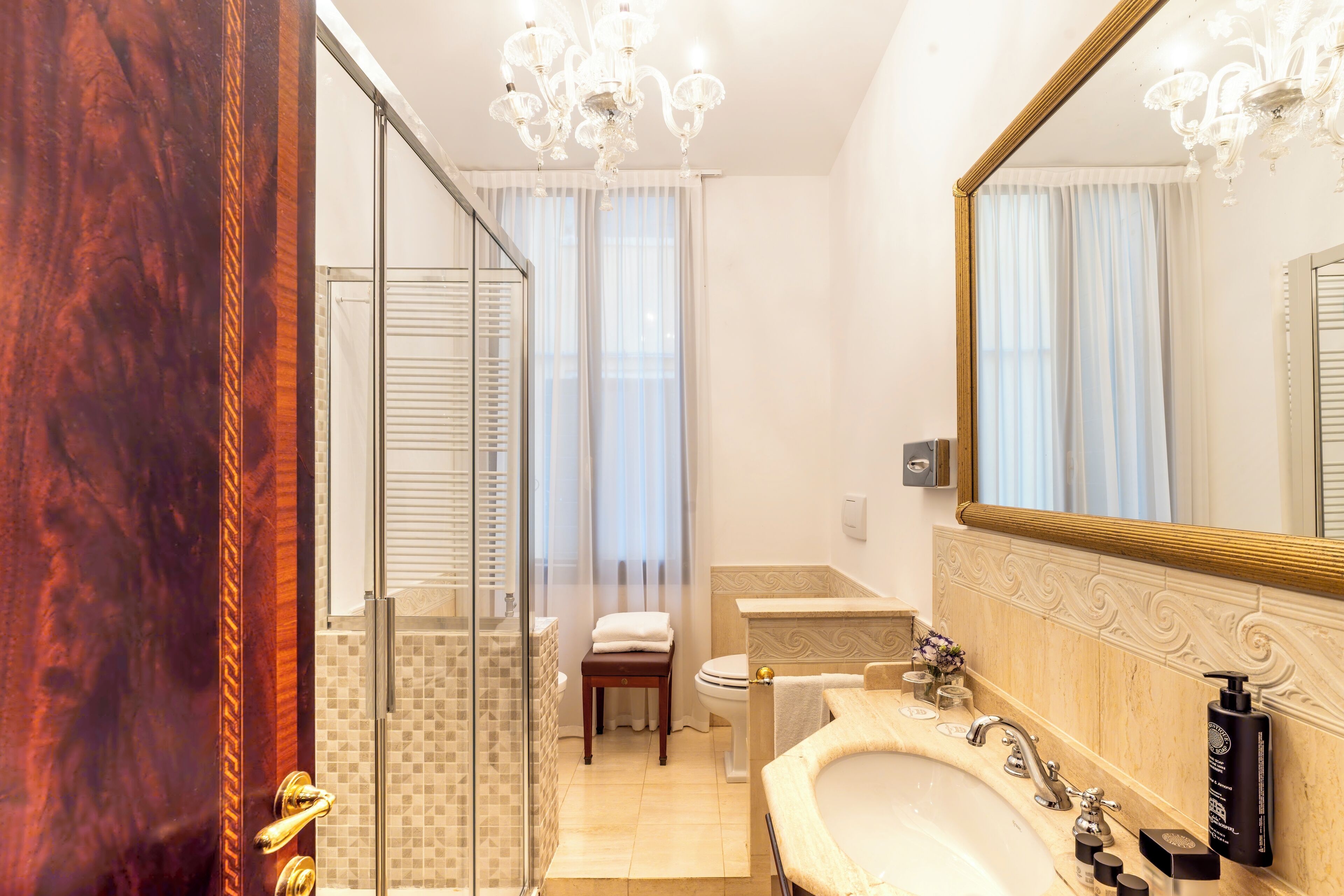 junior suite | bathroom | hair dryer, slippers, bidet, towels