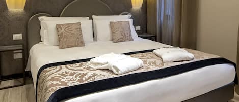 Classic Double Room | Minibar, in-room safe, desk, blackout curtains