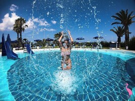 Outdoor pool, pool umbrellas, sun loungers