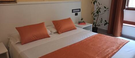 Down duvets, in-room safe, desk, free WiFi