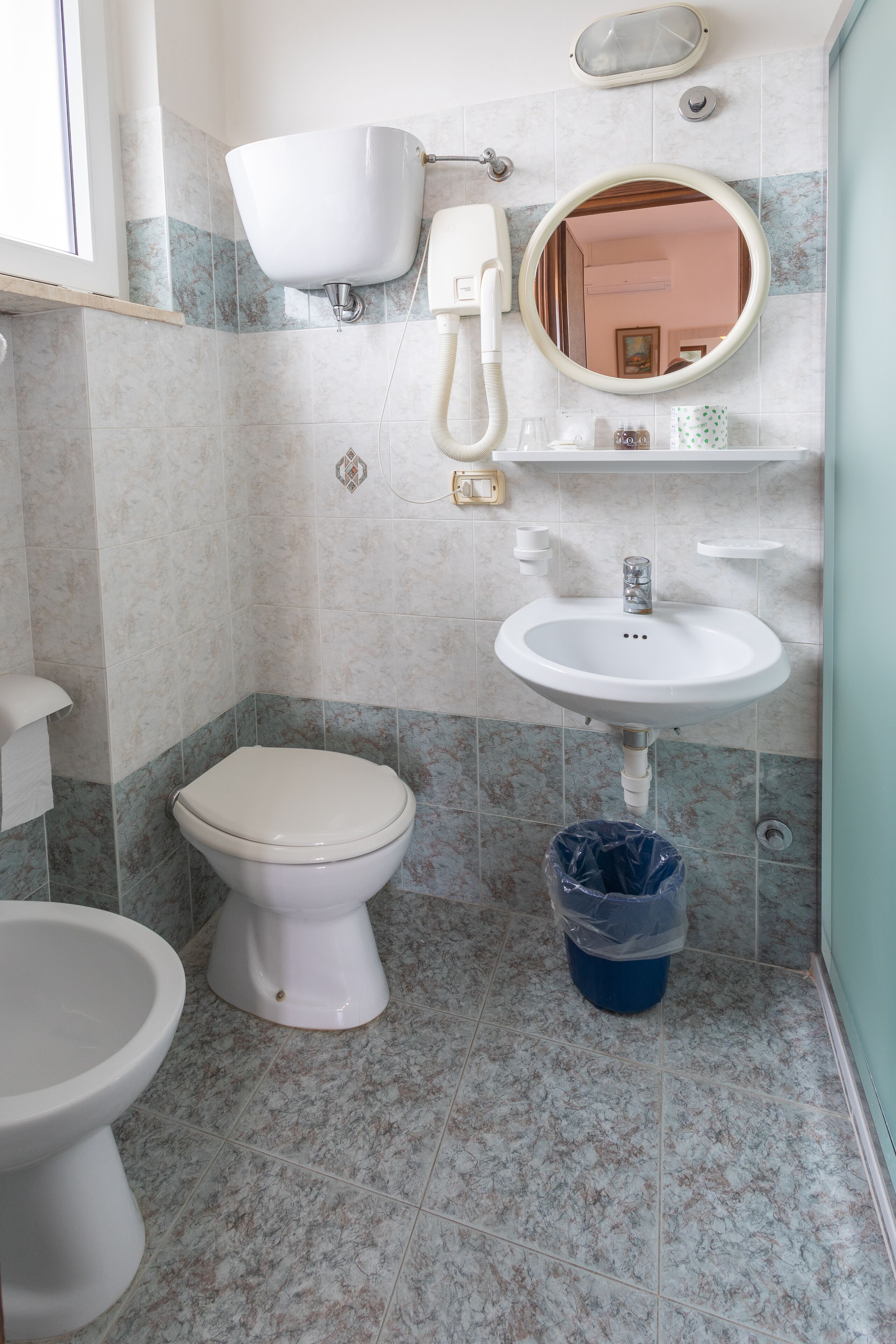 free toiletries, hair dryer, bidet, towels