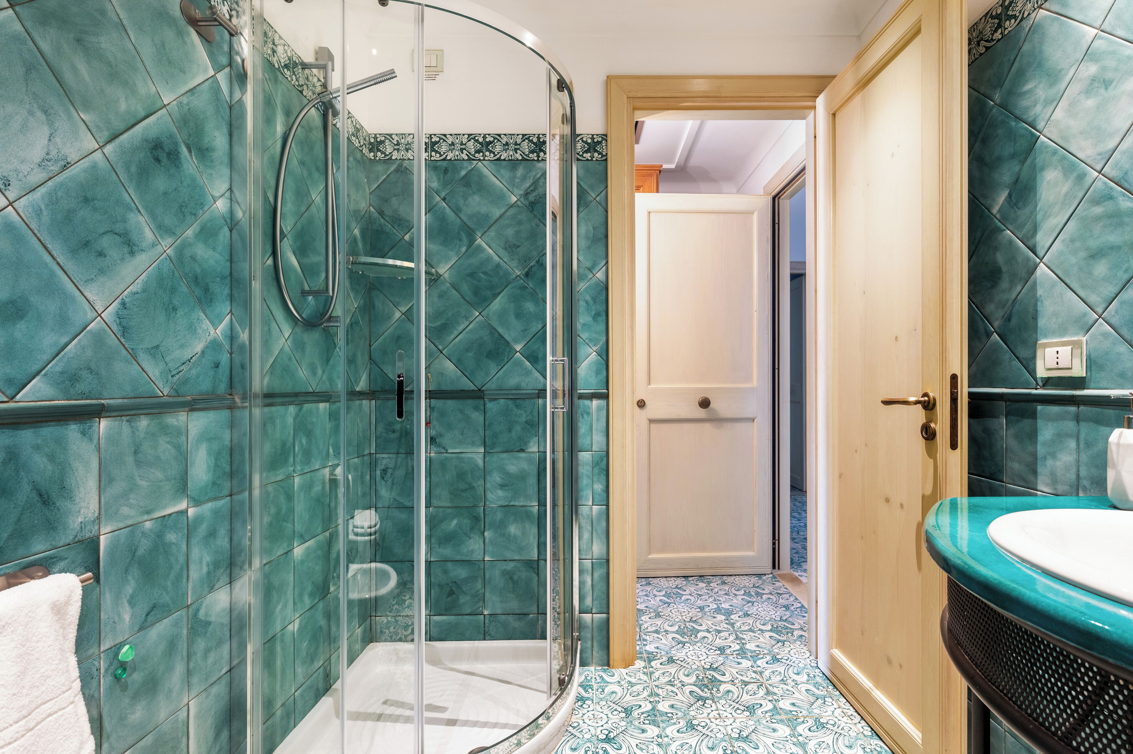 junior suite | bathroom | designer toiletries, hair dryer, slippers, bidet